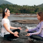 Morning yoga session at an Ayurvedic wellness retreat in Kerala, India