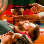 Sound healing session with Tibetan singing bowls at a Rishikesh yoga retreat