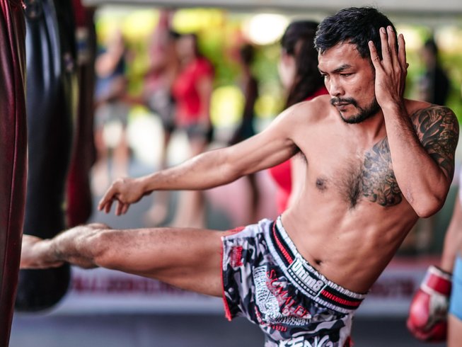 Yoga class in traditional sala at Sumalee Boxing Gym Phuket